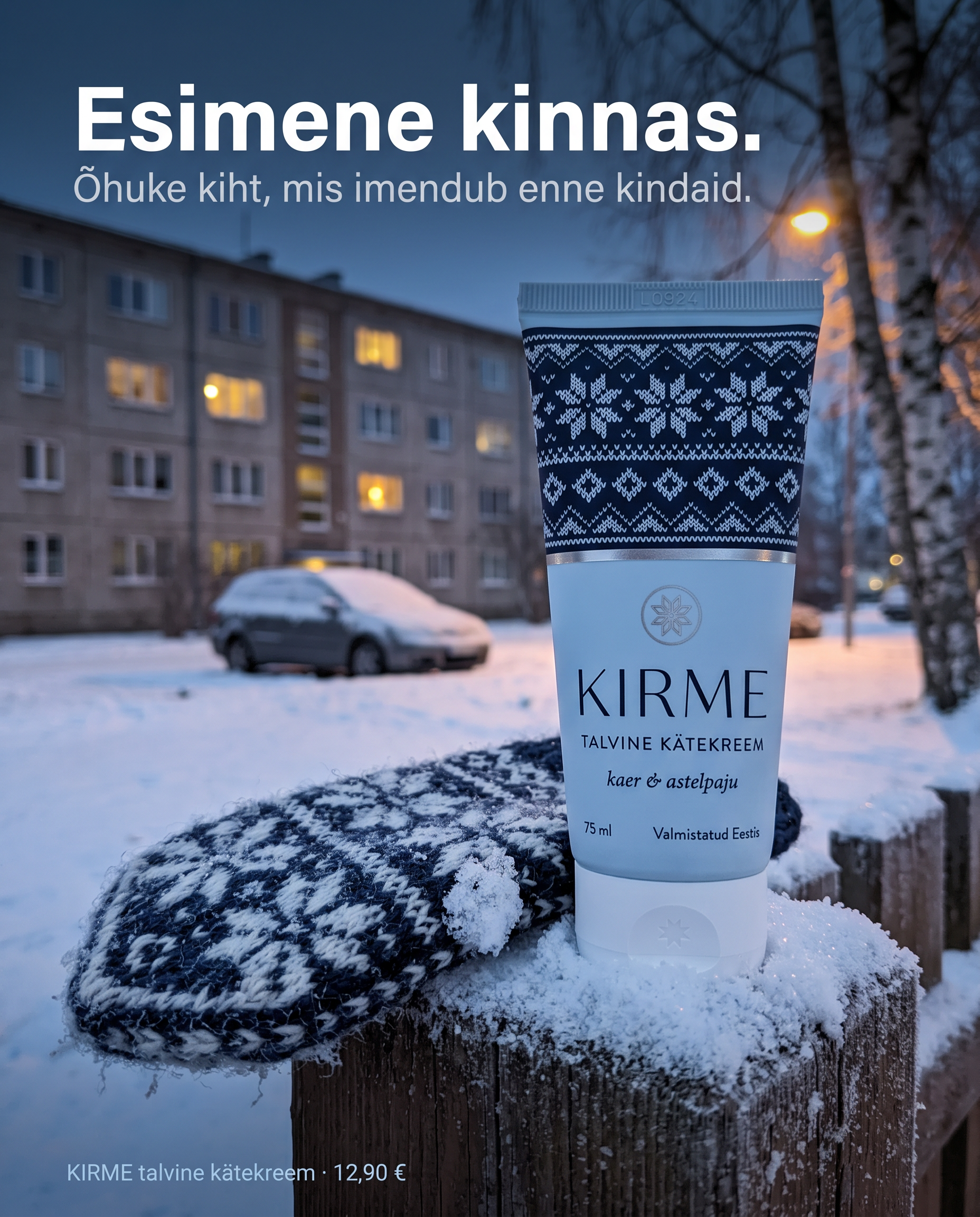 KIRME kätekreemi reklaam: tuub lumisel aiapostil kinda kõrval, pealkiri „Esimene kinnas.“